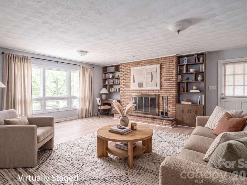 2542 NC 10 Highway, Conover, NC 28613.  MLS# CAR4412366, YatesRealty ID 43502. Living room virtually staged to show potential