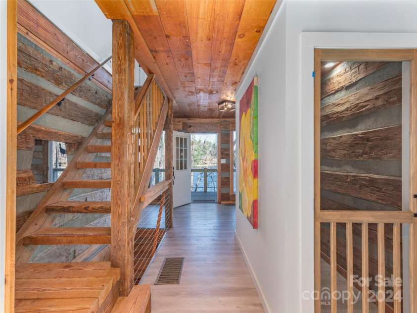 1679 Woods Mountain Trail, Cullowhee, NC 28723.  MLS# CAR4206125, YatesRealty ID 4351. Foyer area through the 47