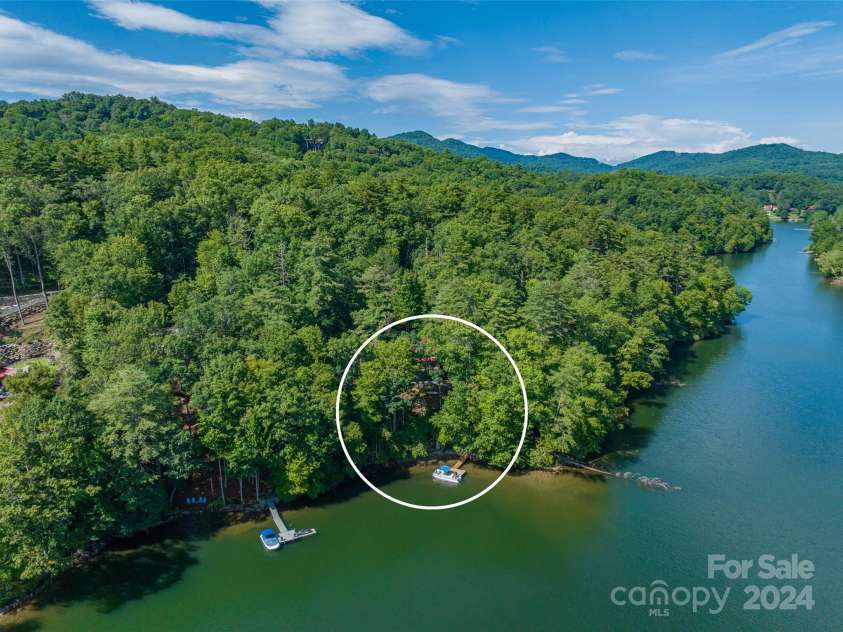 1679 Woods Mountain Trail, Cullowhee, NC 28723.  MLS# CAR4206125, YatesRealty ID 4351. Uncommon level of lakefront privacy