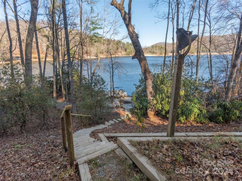 1679 Woods Mountain Trail, Cullowhee, NC 28723.  MLS# CAR4206125, YatesRealty ID 4351. Walking path to lake