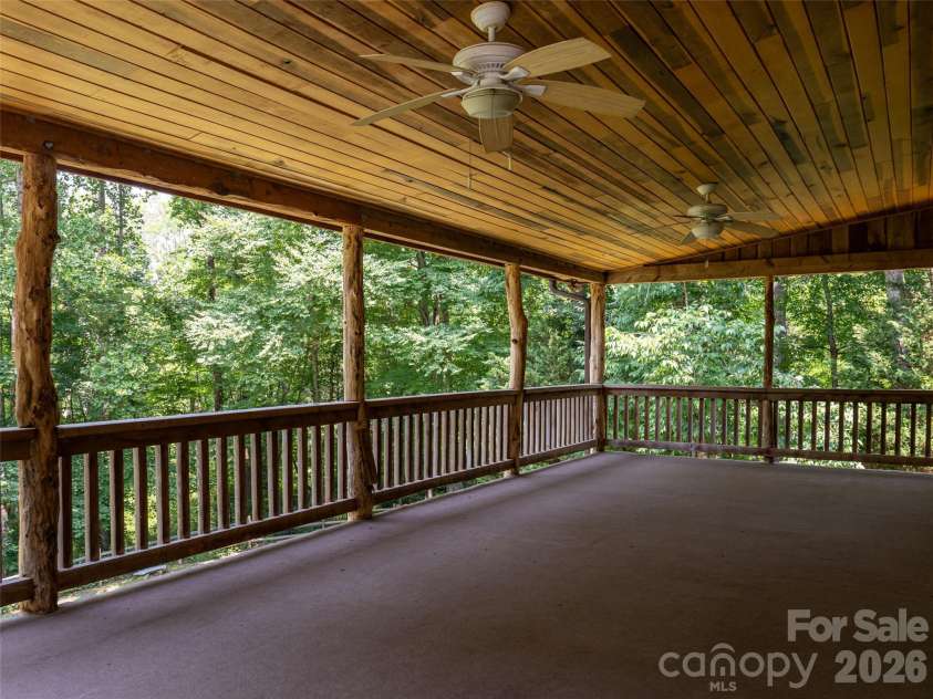 24 Gregory Hill Road, Fairview, NC 28730.  MLS# CAR4408771, YatesRealty ID 43545. Large covered front porch
