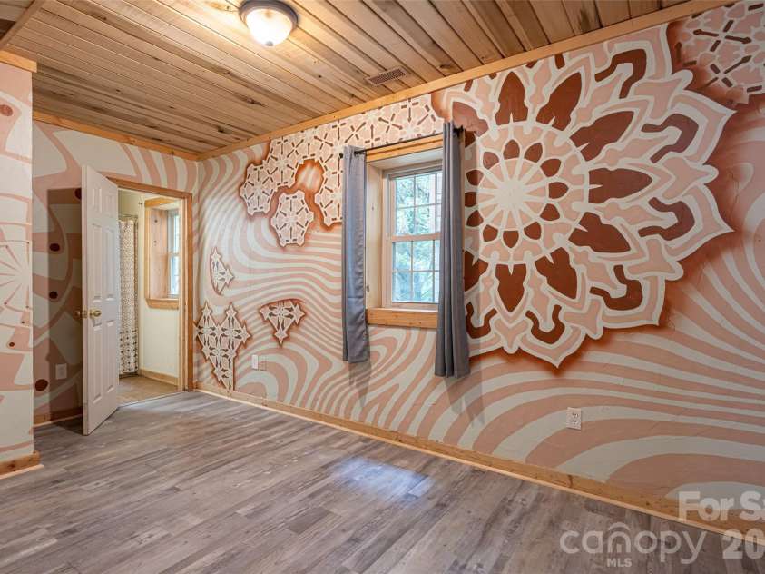 24 Gregory Hill Road, Fairview, NC 28730.  MLS# CAR4408771, YatesRealty ID 43545. Lower Level Bedroom