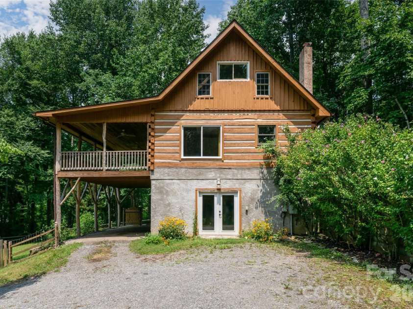 24 Gregory Hill Road, Fairview, NC 28730.  MLS# CAR4408771, YatesRealty ID 43545. Lower Level entrance with parking area