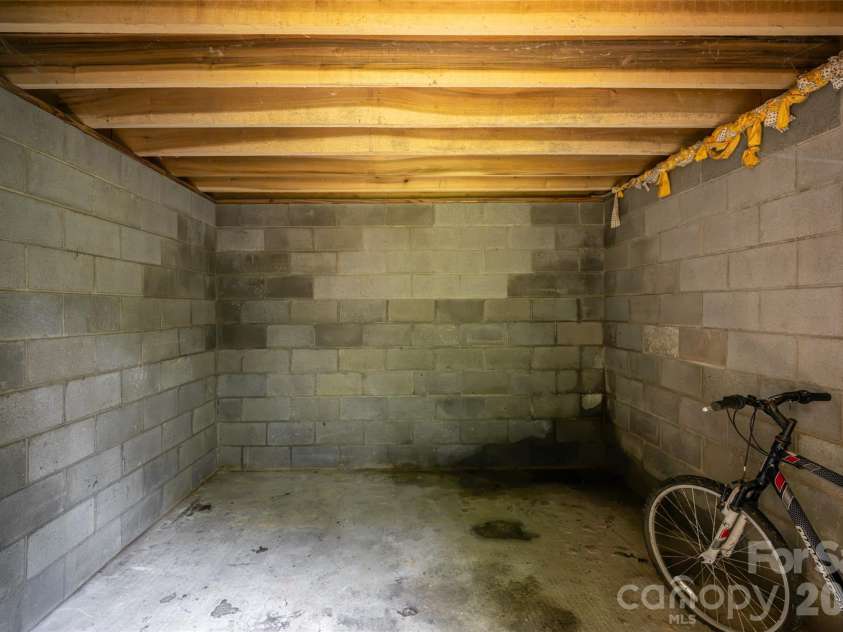 24 Gregory Hill Road, Fairview, NC 28730.  MLS# CAR4408771, YatesRealty ID 43545. Storage under outbuilding