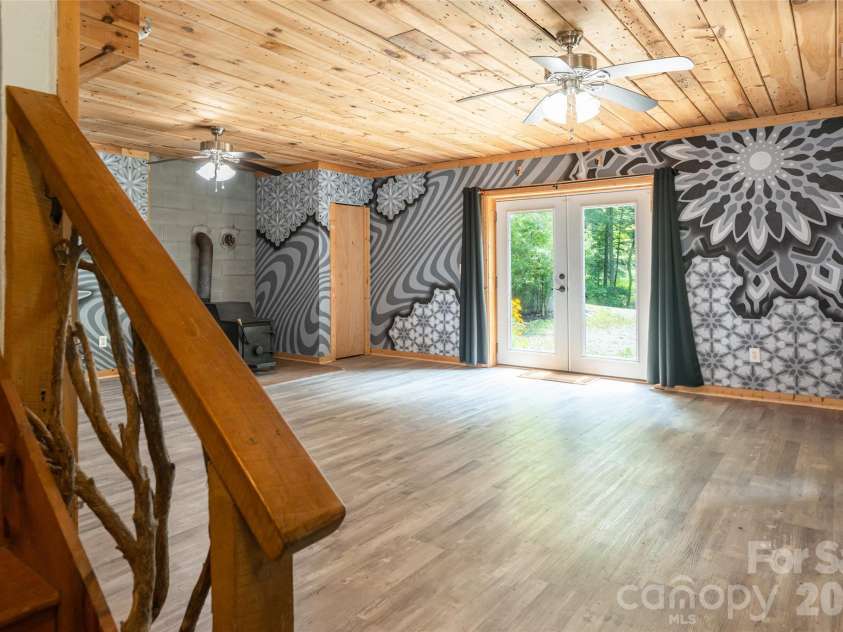 24 Gregory Hill Road, Fairview, NC 28730.  MLS# CAR4408771, YatesRealty ID 43545. Welcome to the Lower Level