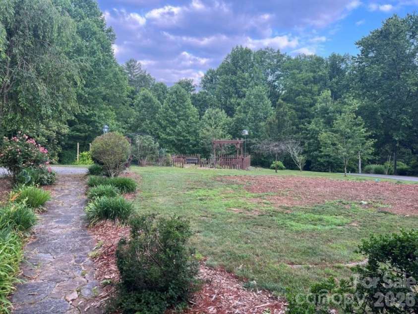 325 Ewbank Road, Etowah, NC 28729.  MLS# CAR4411444, YatesRealty ID 43546. 