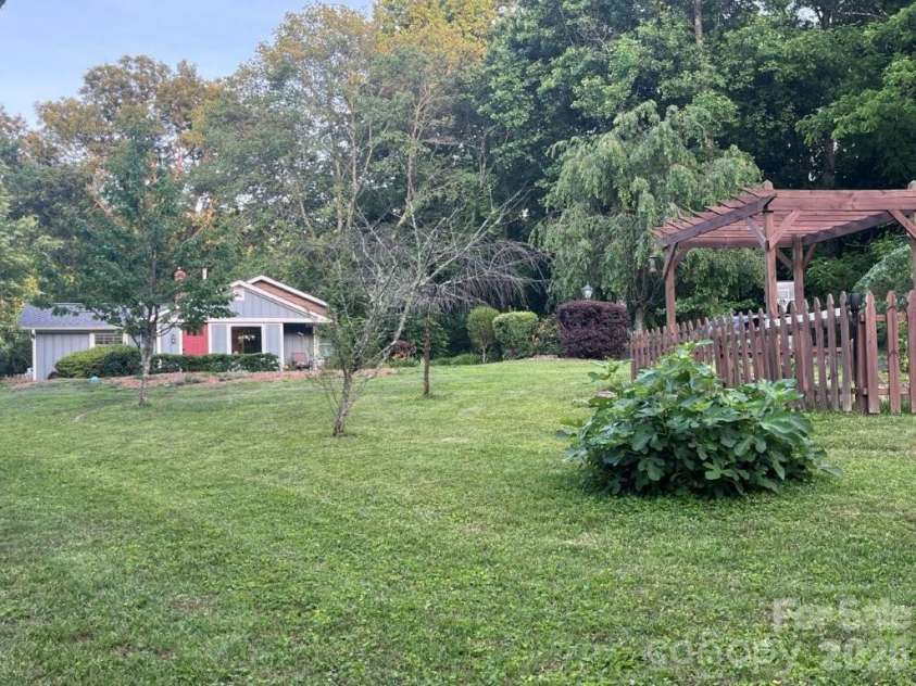 325 Ewbank Road, Etowah, NC 28729.  MLS# CAR4411444, YatesRealty ID 43546. 