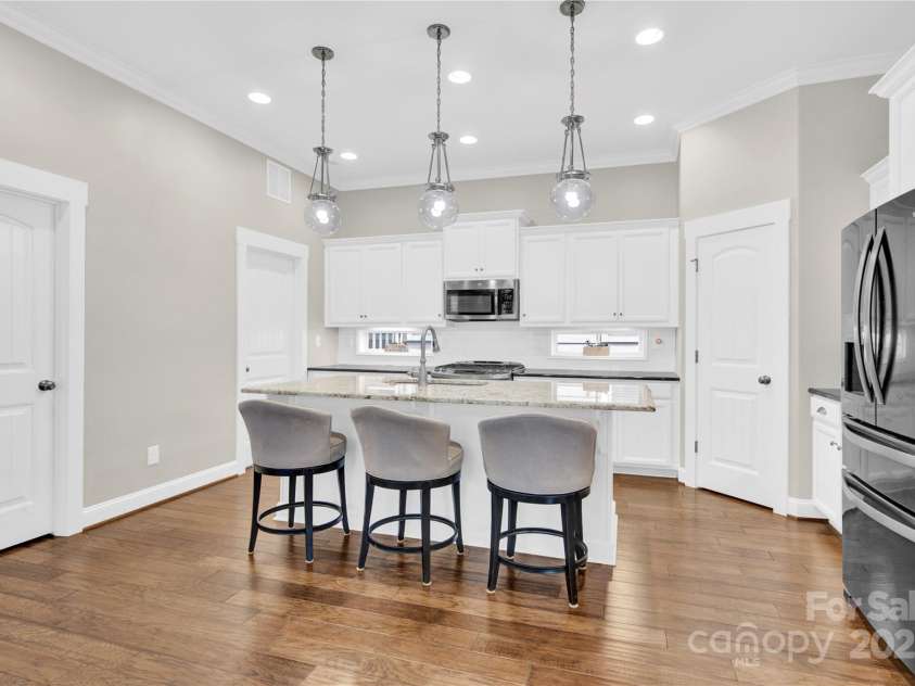 12424 Bradford Park Drive, Davidson, NC 28036.  MLS# CAR4241762, YatesRealty ID 4355. Ample counter and cabinet space.
