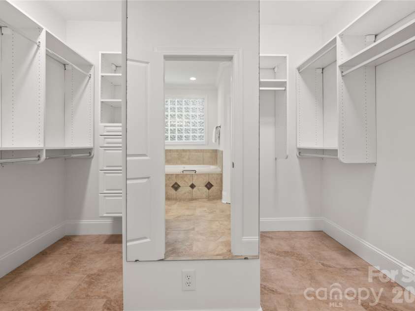 868 Savile Lane, Fort Mill, SC 29715.  MLS# CAR4409801, YatesRealty ID 43556. His and hers closet