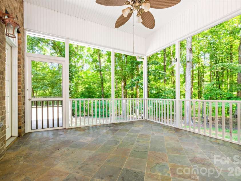 868 Savile Lane, Fort Mill, SC 29715.  MLS# CAR4409801, YatesRealty ID 43556. Porch access through kitchen and outdoors