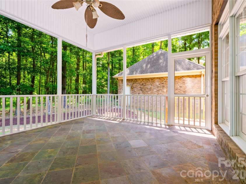 868 Savile Lane, Fort Mill, SC 29715.  MLS# CAR4409801, YatesRealty ID 43556. Screened in porch
