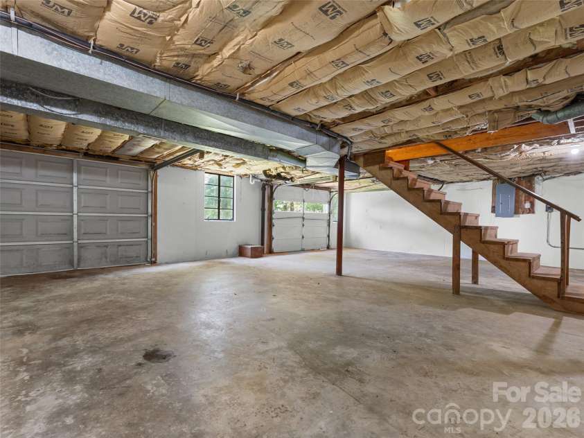 116 Candler School Road, Candler, NC 28715.  MLS# CAR4411959, YatesRealty ID 43563. Full basement