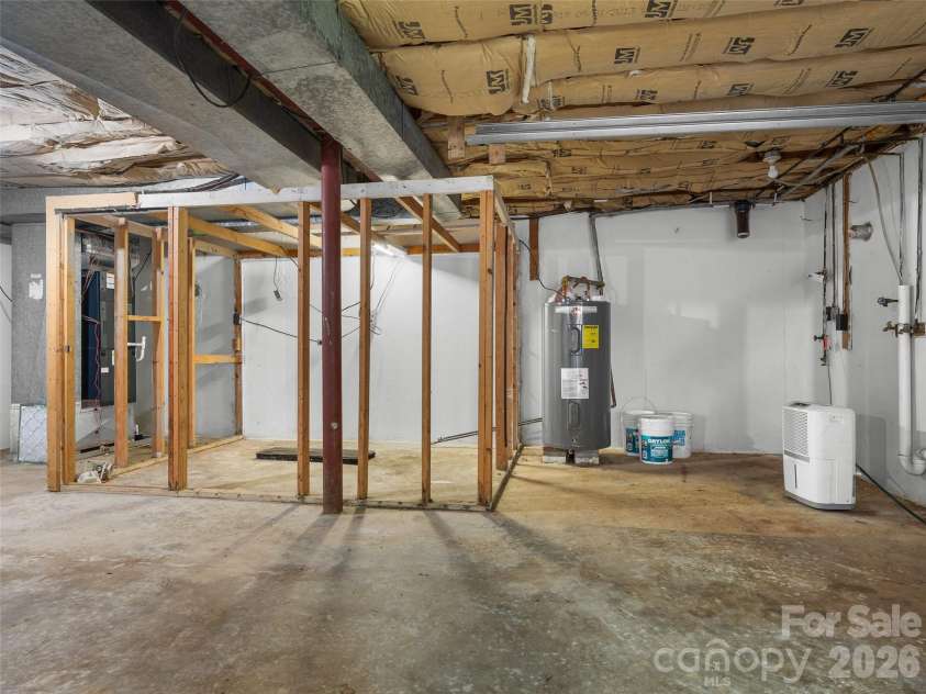 116 Candler School Road, Candler, NC 28715.  MLS# CAR4411959, YatesRealty ID 43563. Laundry area in basement