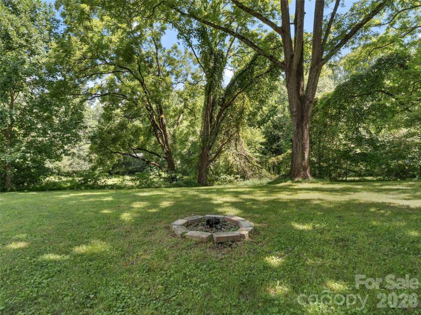 116 Candler School Road, Candler, NC 28715.  MLS# CAR4411959, YatesRealty ID 43563. Open yard