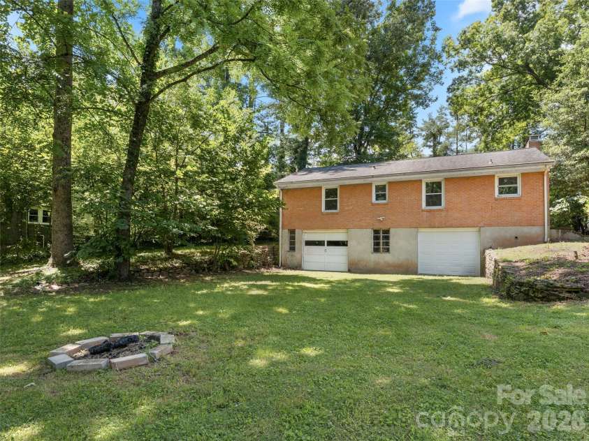 116 Candler School Road, Candler, NC 28715.  MLS# CAR4411959, YatesRealty ID 43563. Rear