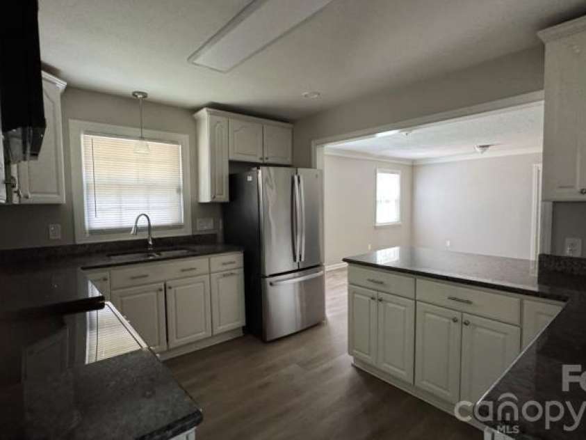 7511 Monroe Road, Charlotte, NC 28212.  MLS# CAR4407838, YatesRealty ID 43579. Kitchen Pic 2