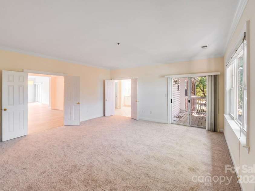 5601 Fairview Road, Charlotte, NC 28209.  MLS# CAR4302815, YatesRealty ID 4358. Primary Bedroom with balcony