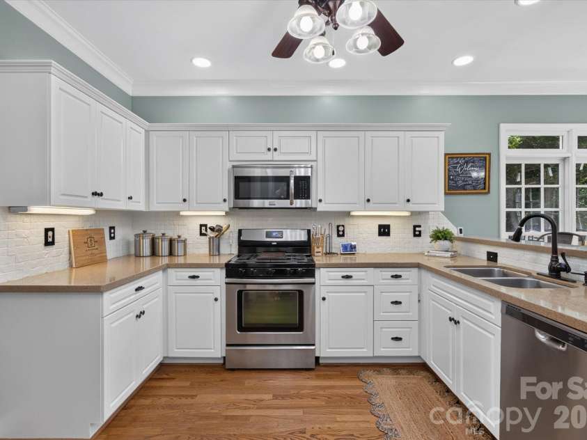 1235 Old Coach Lane, Rock Hill, SC 29732.  MLS# CAR4411196, YatesRealty ID 43586. Freshly painted cabinets and backsplash