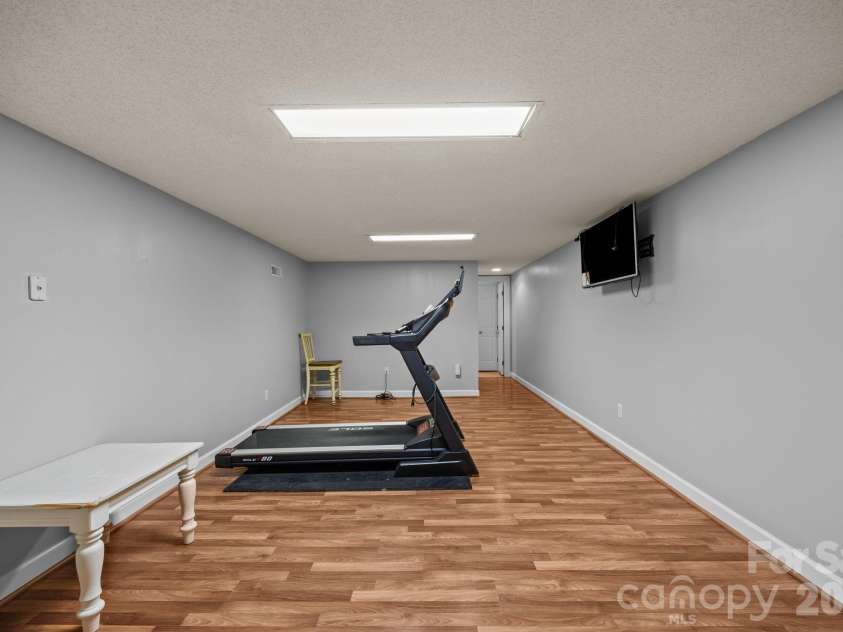 5 Silverstone Drive, Asheville, NC 28805.  MLS# CAR4303811, YatesRealty ID 4359. Basement Flex Space