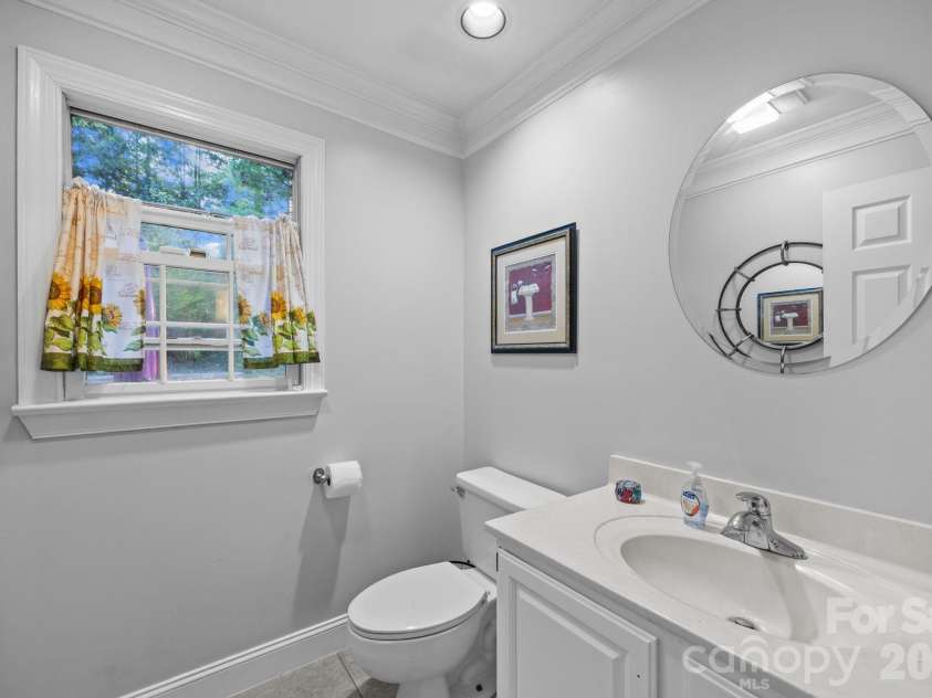 5 Silverstone Drive, Asheville, NC 28805.  MLS# CAR4303811, YatesRealty ID 4359. Main Level Half Bath