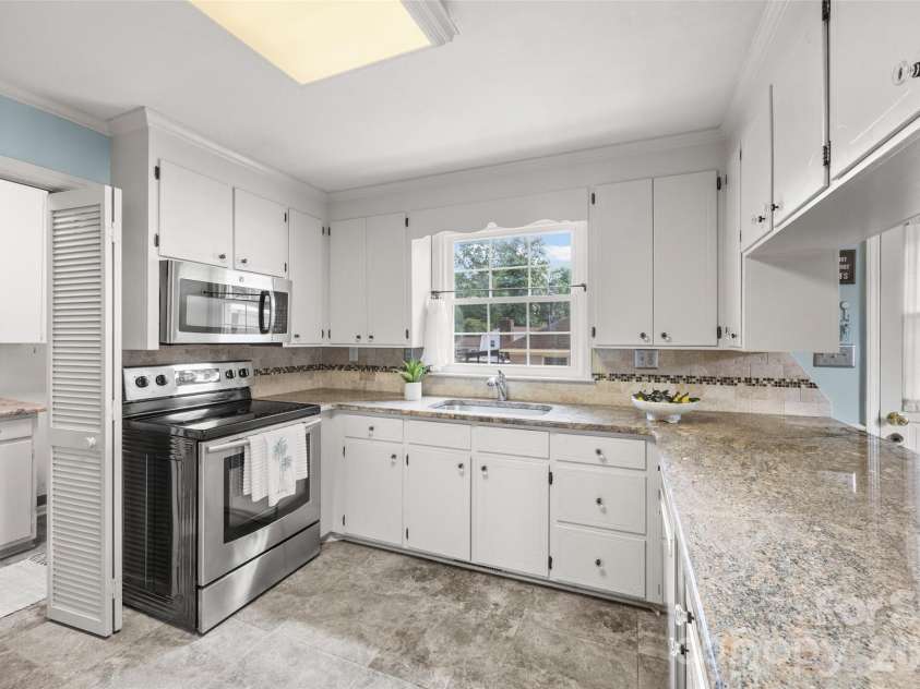 706 Unity Street, Fort Mill, SC 29715.  MLS# CAR4412427, YatesRealty ID 43597. Attached laundry and pantry