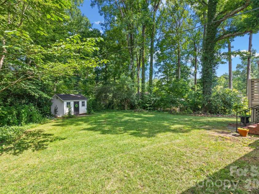 706 Unity Street, Fort Mill, SC 29715.  MLS# CAR4412427, YatesRealty ID 43597. Private yard backing up to trees