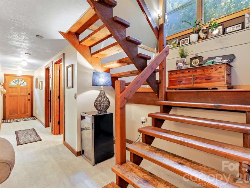 929 Camp Creek Road, Union Mills, NC 28167.  MLS# CAR4412648, YatesRealty ID 43599. Staircase from basement