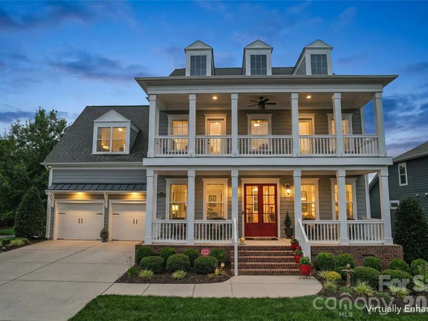 14330 Promenade Drive, Huntersville, NC 28078.  MLS# CAR4412655, YatesRealty ID 43600. Virtually enhanced night time exterior