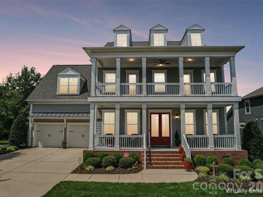 14330 Promenade Drive, Huntersville, NC 28078.  MLS# CAR4412655, YatesRealty ID 43600. Virtually enhanced night time exterior