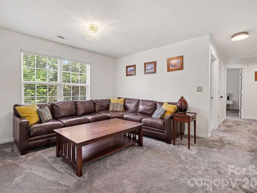 10120 Shanaclear Avenue, Concord, NC 28027.  MLS# CAR4406441, YatesRealty ID 43608. Upstairs Loft