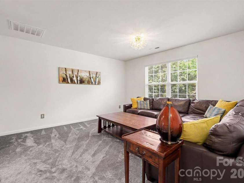 10120 Shanaclear Avenue, Concord, NC 28027.  MLS# CAR4406441, YatesRealty ID 43608. Upstairs Loft
