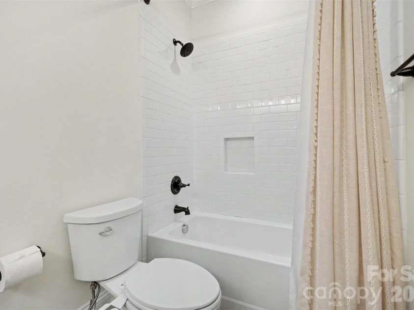 2409 Marlowe Avenue, Charlotte, NC 28208.  MLS# CAR4407568, YatesRealty ID 43611. Upstairs hall bathroom.