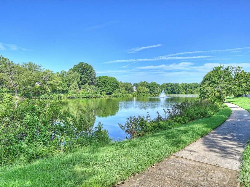 8033 Oratorio Place, Charlotte, NC 28270.  MLS# CAR4408355, YatesRealty ID 43619. Walking path around the lake