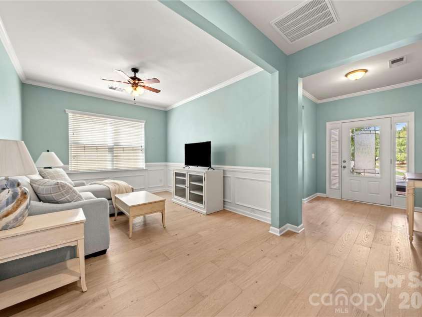 1601 Deer Meadows Drive, Waxhaw, NC 28173.  MLS# CAR4369779, YatesRealty ID 43620. Den with wainscoting