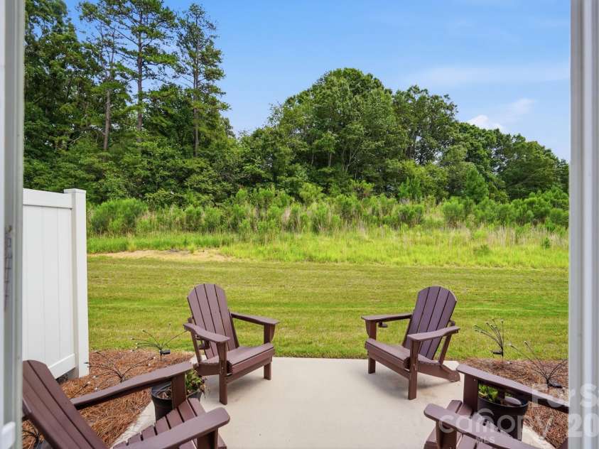 5243 Maynard Hill Drive, Monroe, NC 28110.  MLS# CAR4413326, YatesRealty ID 43634. Back Patio.
