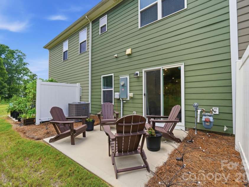 5243 Maynard Hill Drive, Monroe, NC 28110.  MLS# CAR4413326, YatesRealty ID 43634. Back Patio.