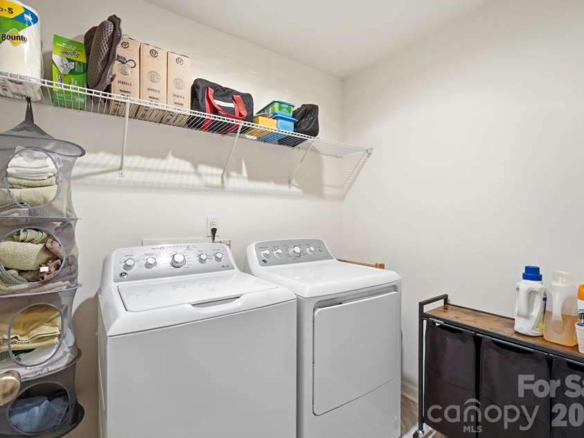 5243 Maynard Hill Drive, Monroe, NC 28110.  MLS# CAR4413326, YatesRealty ID 43634. Laundry room.