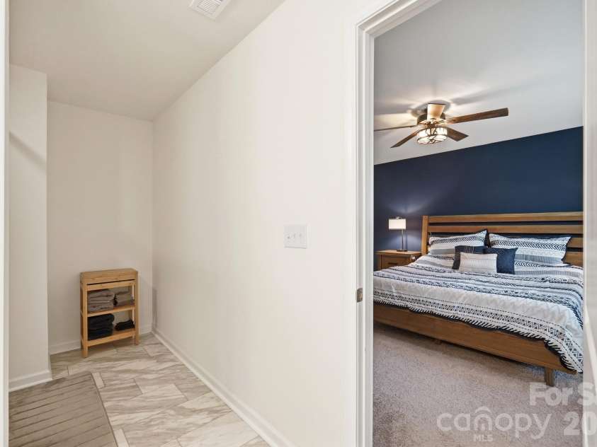 5243 Maynard Hill Drive, Monroe, NC 28110.  MLS# CAR4413326, YatesRealty ID 43634. Primary Bathroom view into bedroom.