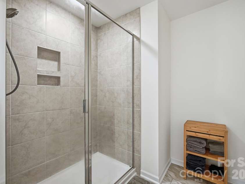 5243 Maynard Hill Drive, Monroe, NC 28110.  MLS# CAR4413326, YatesRealty ID 43634. Primary Shower.