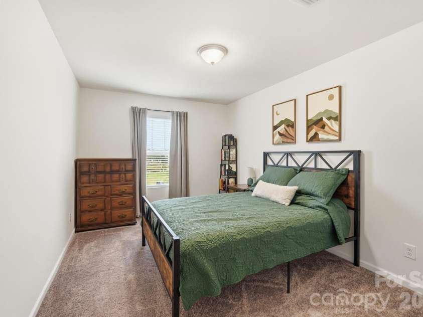 5243 Maynard Hill Drive, Monroe, NC 28110.  MLS# CAR4413326, YatesRealty ID 43634. Secondary Bedroom.