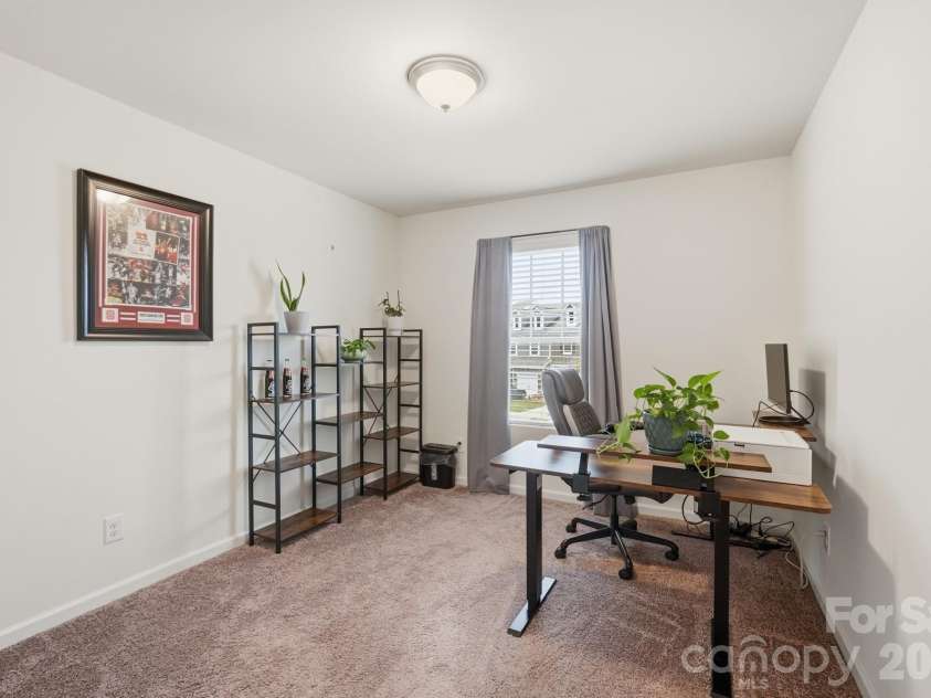 5243 Maynard Hill Drive, Monroe, NC 28110.  MLS# CAR4413326, YatesRealty ID 43634. Secondary Bedroom used as an office.