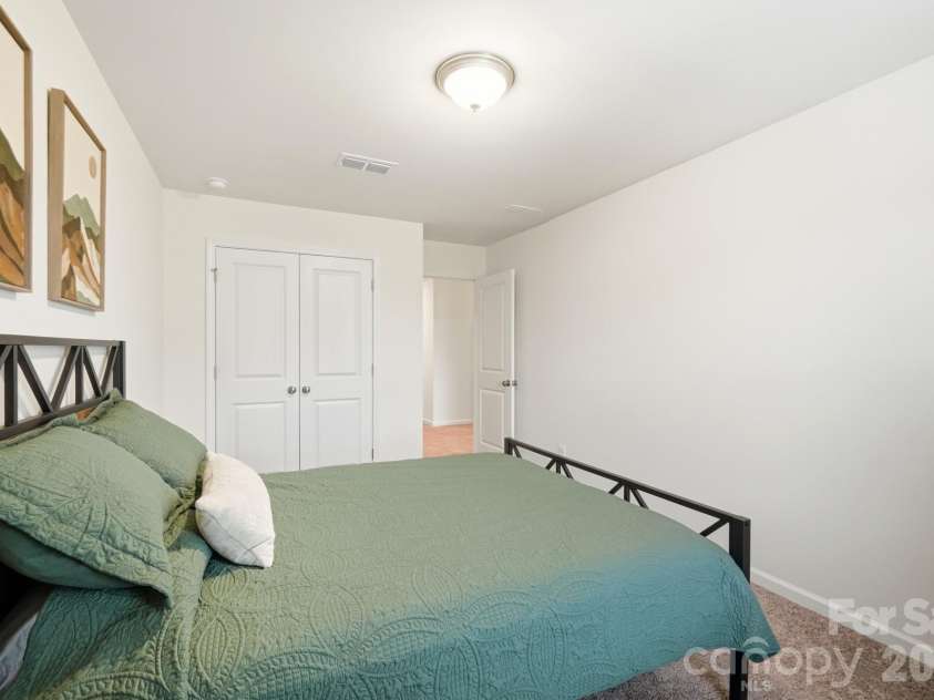 5243 Maynard Hill Drive, Monroe, NC 28110.  MLS# CAR4413326, YatesRealty ID 43634. Secondary Bedroom view from window.