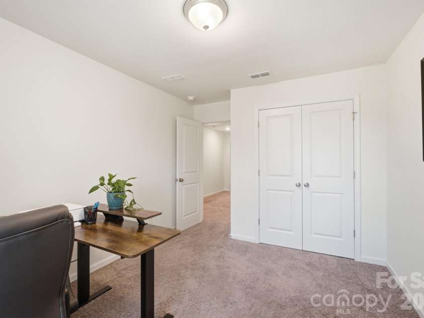 5243 Maynard Hill Drive, Monroe, NC 28110.  MLS# CAR4413326, YatesRealty ID 43634. Secondary Bedroom view from window.