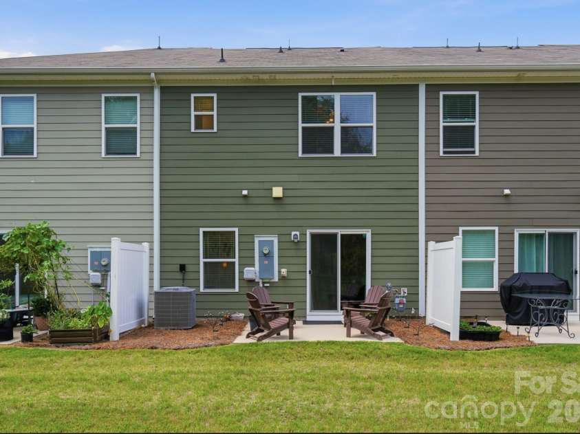 5243 Maynard Hill Drive, Monroe, NC 28110.  MLS# CAR4413326, YatesRealty ID 43634. View from wooded area.