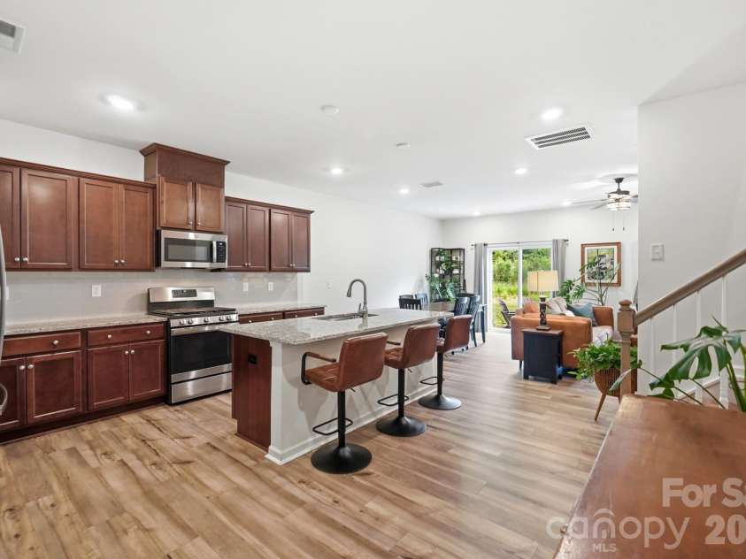 5243 Maynard Hill Drive, Monroe, NC 28110.  MLS# CAR4413326, YatesRealty ID 43634. Walk into an open floor plan into the kitchen.