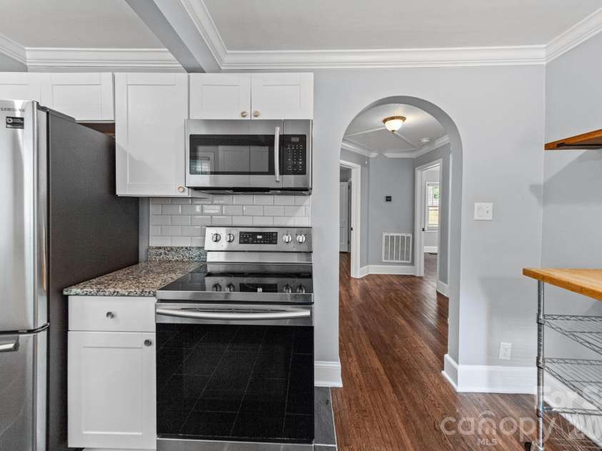 3137 Mathis Drive, Charlotte, NC 28208.  MLS# CAR4412024, YatesRealty ID 43639. Stainless steel appliances throughout the kitchen.