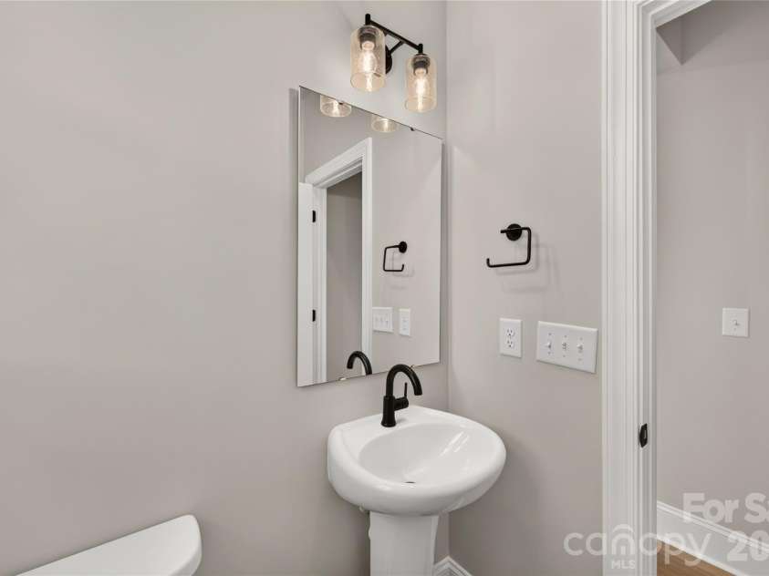 403 Old Town Village Road, Waxhaw, NC 28173.  MLS# CAR4413941, YatesRealty ID 43665. Second-Floor Powder Bath