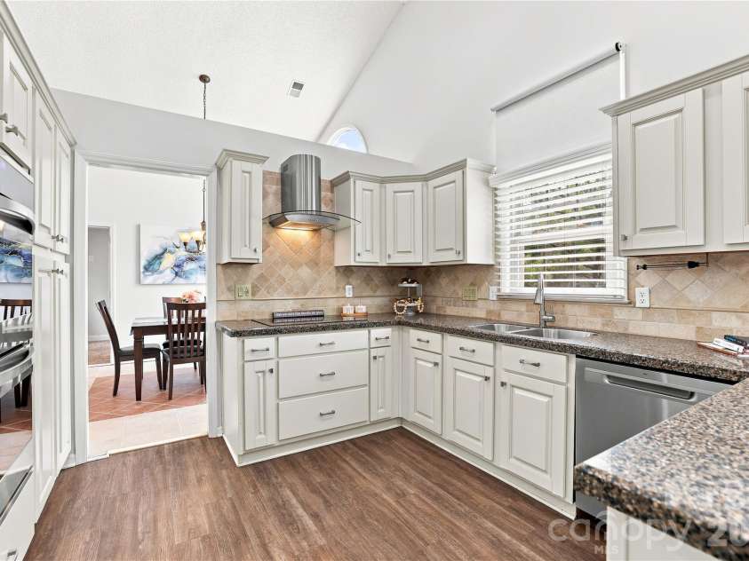 9101 Orchard Lane, Charlotte, NC 28210.  MLS# CAR4409670, YatesRealty ID 43667. Completely renovated kitchen