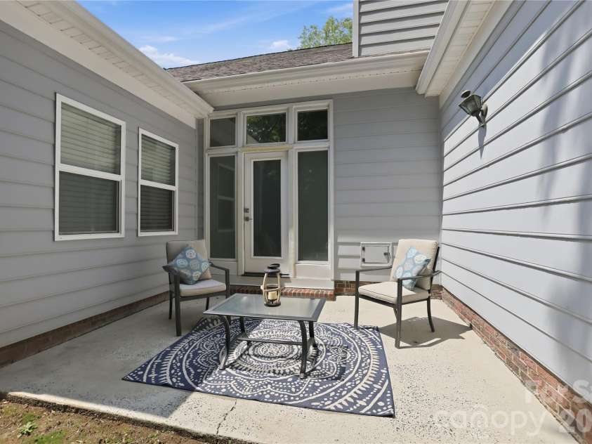 9101 Orchard Lane, Charlotte, NC 28210.  MLS# CAR4409670, YatesRealty ID 43667. Lovely Back Patio
