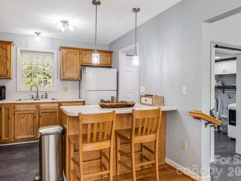 303 Hunter Street, Burnsville, NC 28714.  MLS# CAR4413835, YatesRealty ID 43668. 